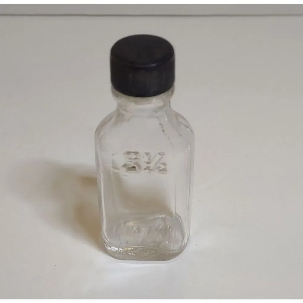 Owens Clear Glass Medicine Bottle Front Embossing 3